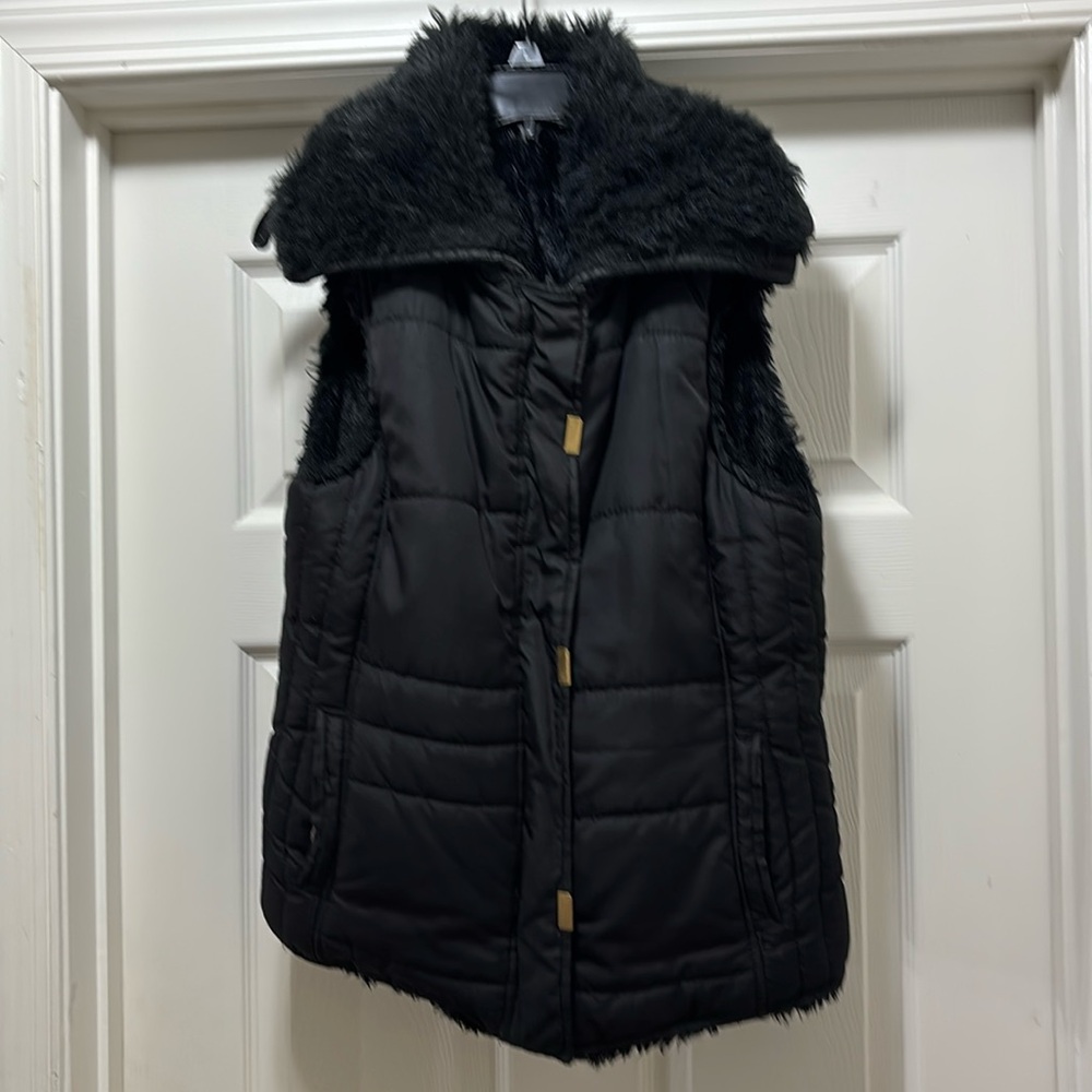 Black reversible vest.